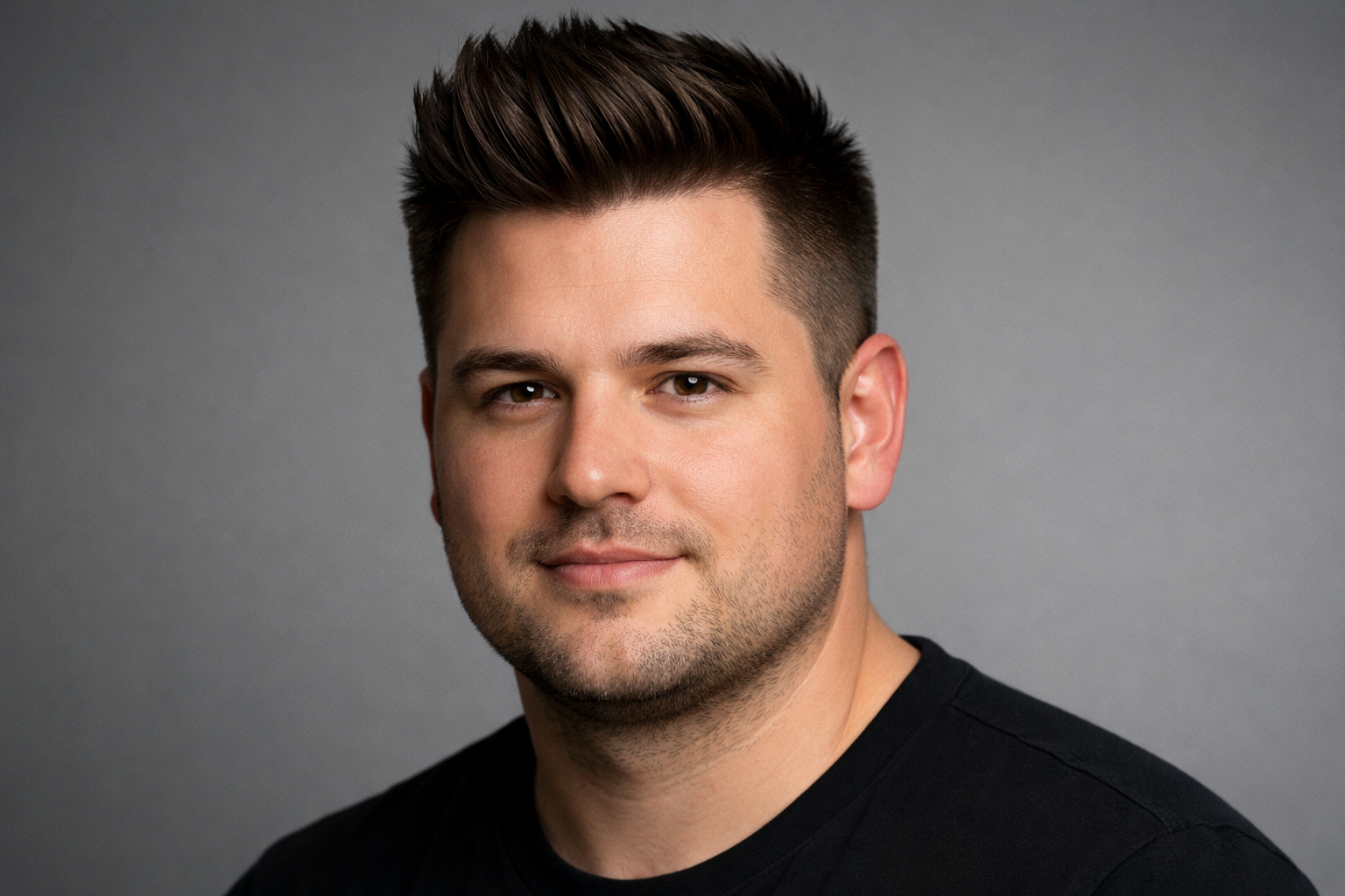 Male with round face shape and defined haircut